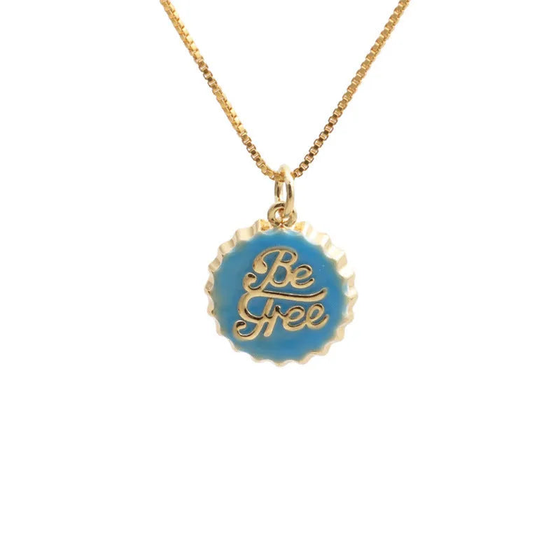 Copper Be Free bottle cap pendant necklace with a gold-plated finish on a 40cm box chain.