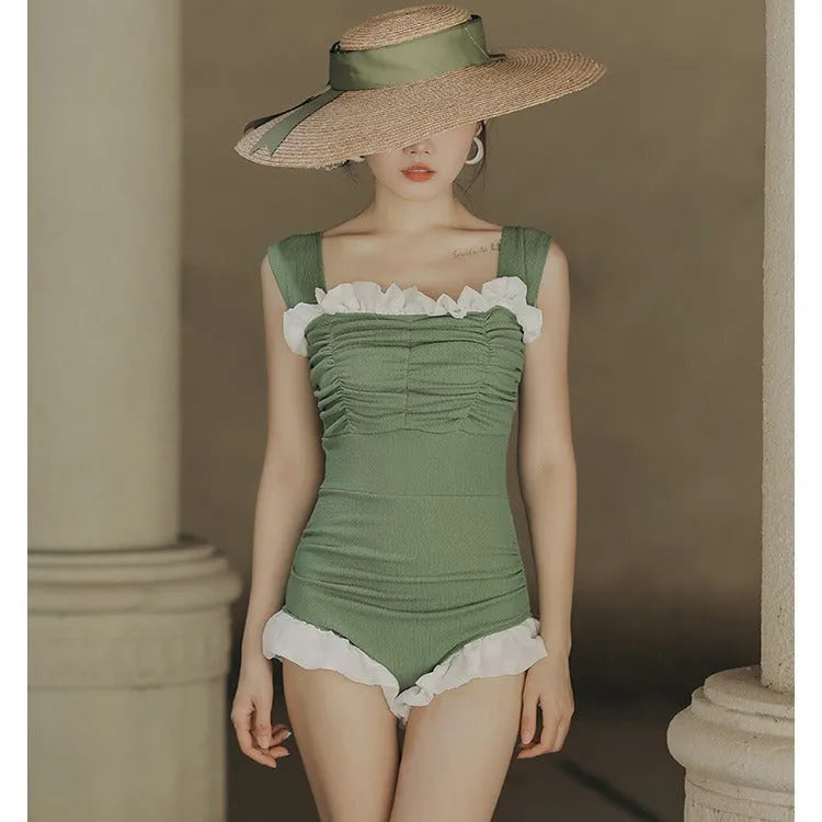 High-waisted one-piece swimsuit in quick-dry polyester fabric, shown in black.