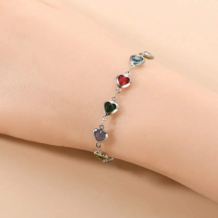 Geometric stainless steel bracelet with electroplated colourful finish showing round and oval design elements