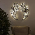Carved metal wall decor art with light in angel wings shape, black iron, double-sided finish