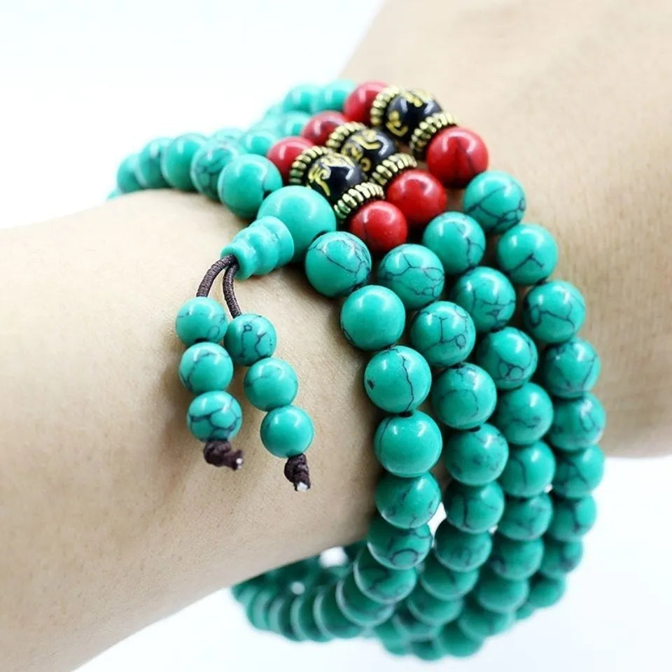 Turquoise Tibetan bracelet with 108 synthetic stone powder beads in round polished finish