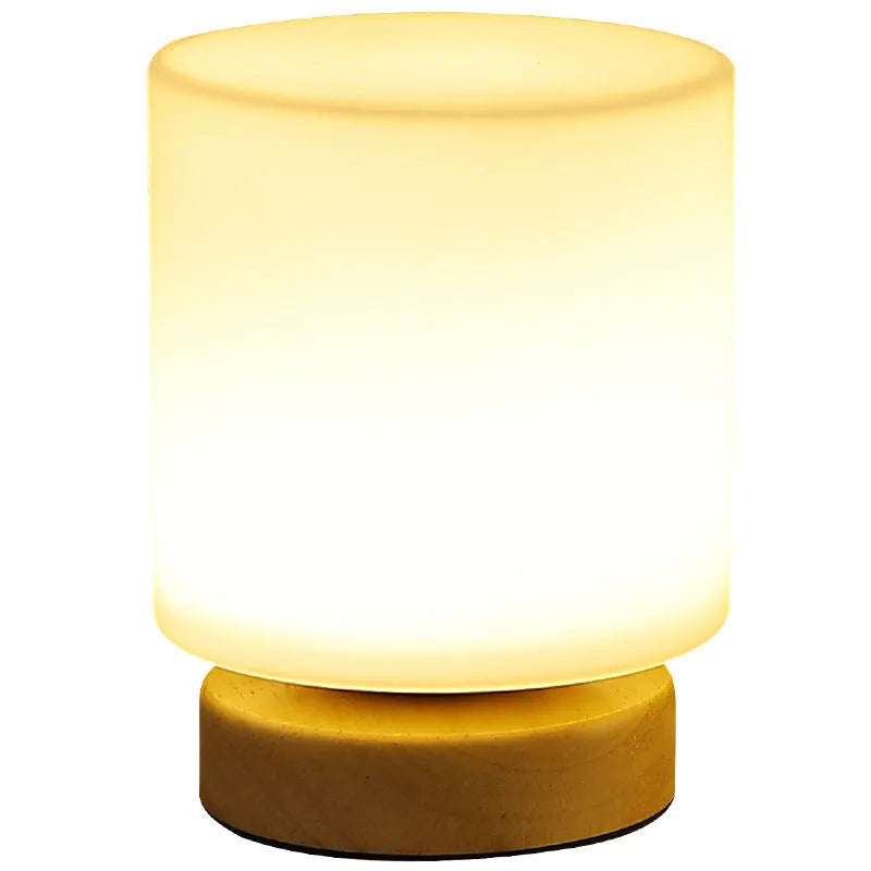 Nordic solid wood flower-shaped USB table lamp with touch dimming control on a desk.