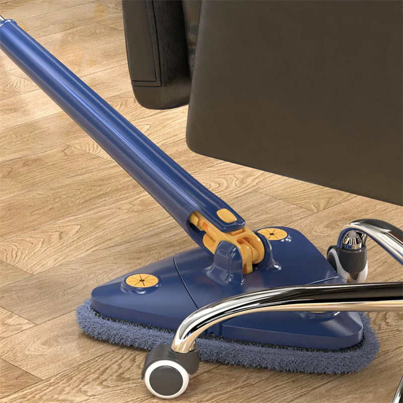 Blue extendable triangle cleaning mop with rotating head and stainless steel pole on a tiled floor.