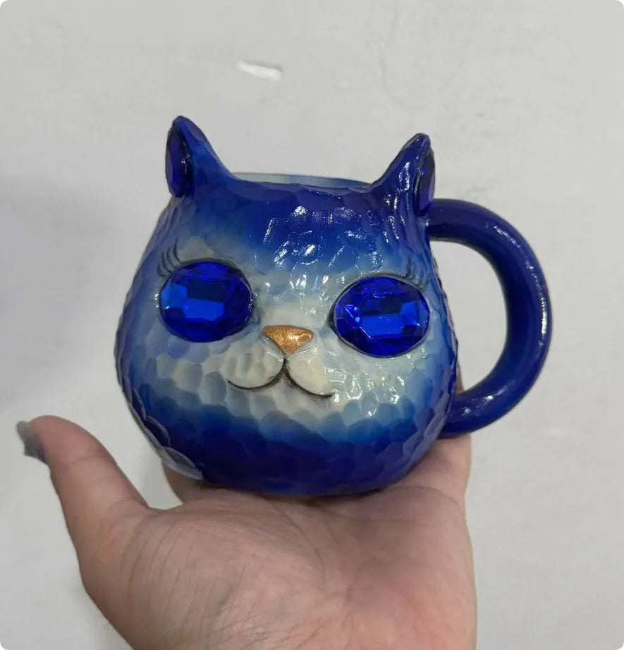 Resin Crystal Earth Cat Cup decorative ornament in purple, green, blue, and pink colour options.