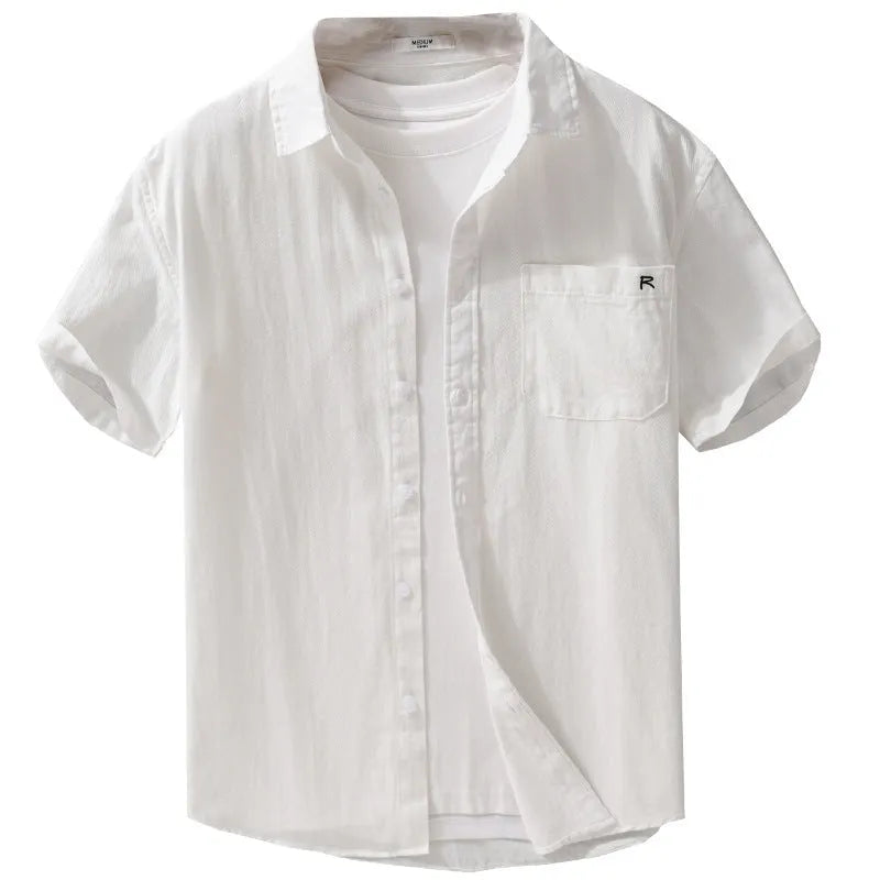 Man wearing a loose light khaki pure cotton short-sleeved cardigan-style shirt.