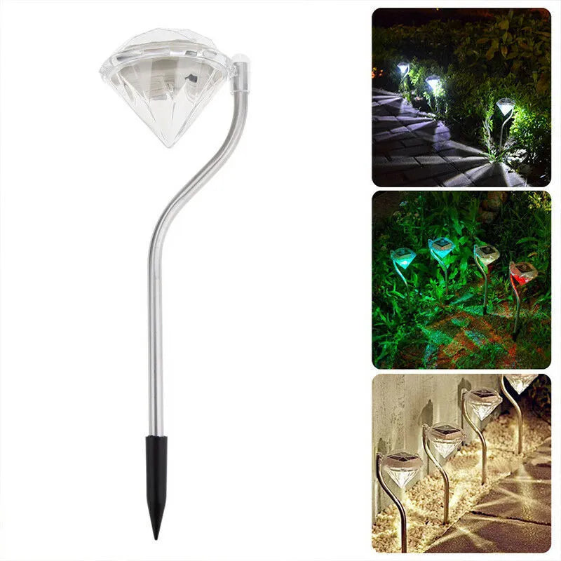 Solar-powered diamond-shaped garden light with solar panel on adjustable stake.