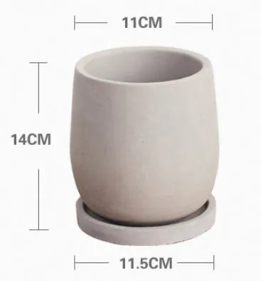 Round cement flower pot desktop 11cm natural colour with tray on a table