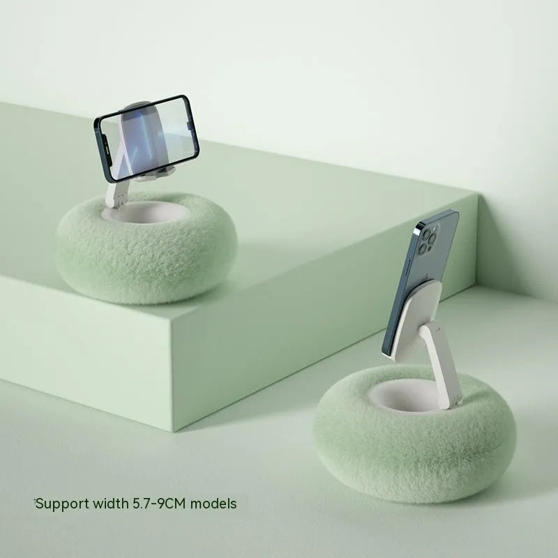 Rotating phone and tablet bracket with adjustable clamp extended vertically on desk