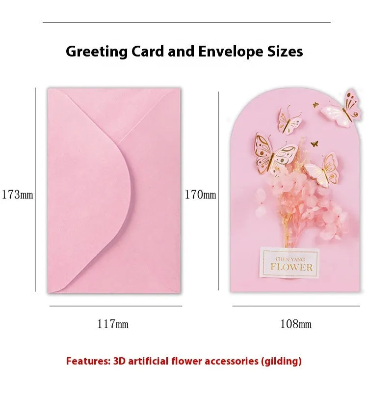 Handmade 3D butterfly birthday greeting card with artificial flowers, shown with its envelope.