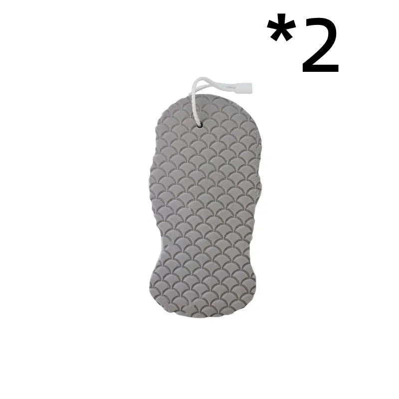 White 3D fish scale pattern bath sponge ball for gentle body exfoliation in the shower.