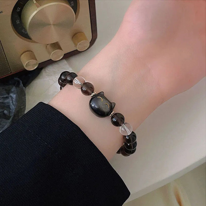 Women's silver stone bracelet with 8mm Ice Stone Opal carved into a cat head pendant.