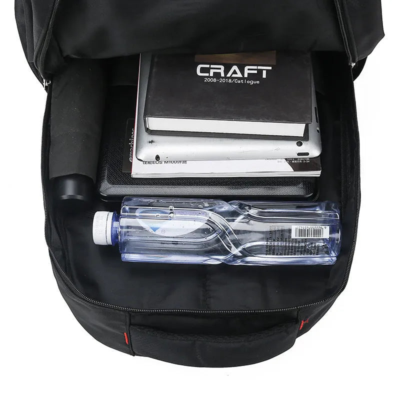 Large capacity men's backpack in black colour with curved shoulder straps and letter detailing