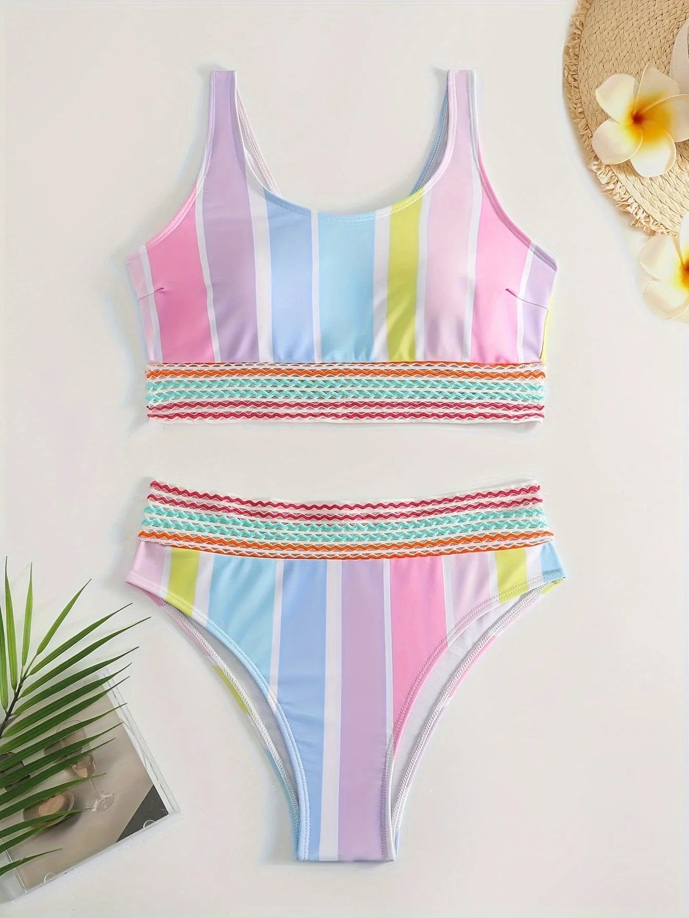 Women's striped two-piece sports bikini set in picture colour, shown for swimming.