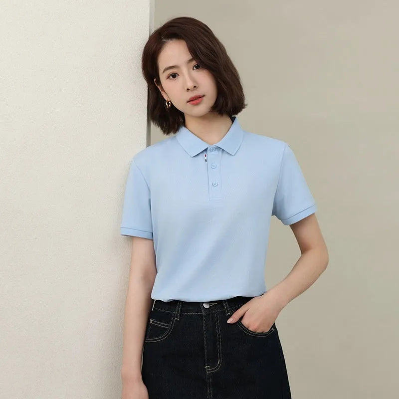 Solid colour catering work polo shirt in ice silk fabric on a hanger, showing short sleeves and regular fit.