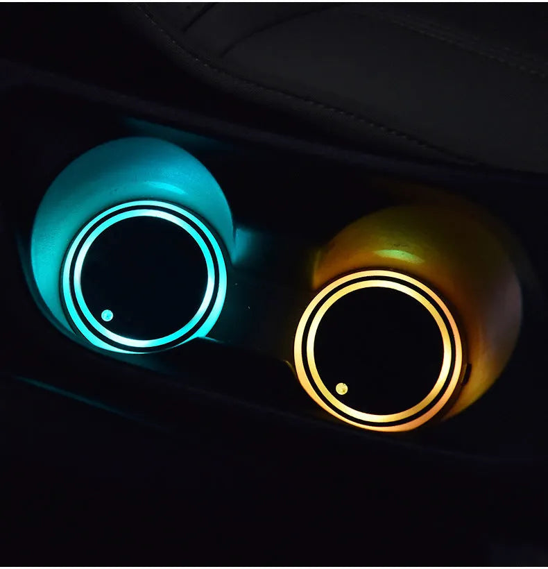 Colourful LED light-up coaster for car cup holder with non-slip surface and USB cable.