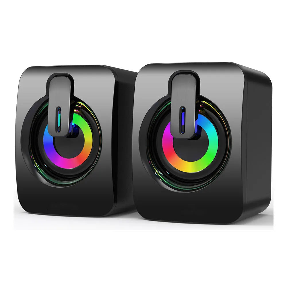 A pair of black plastic USB mini multimedia speakers with wired connection