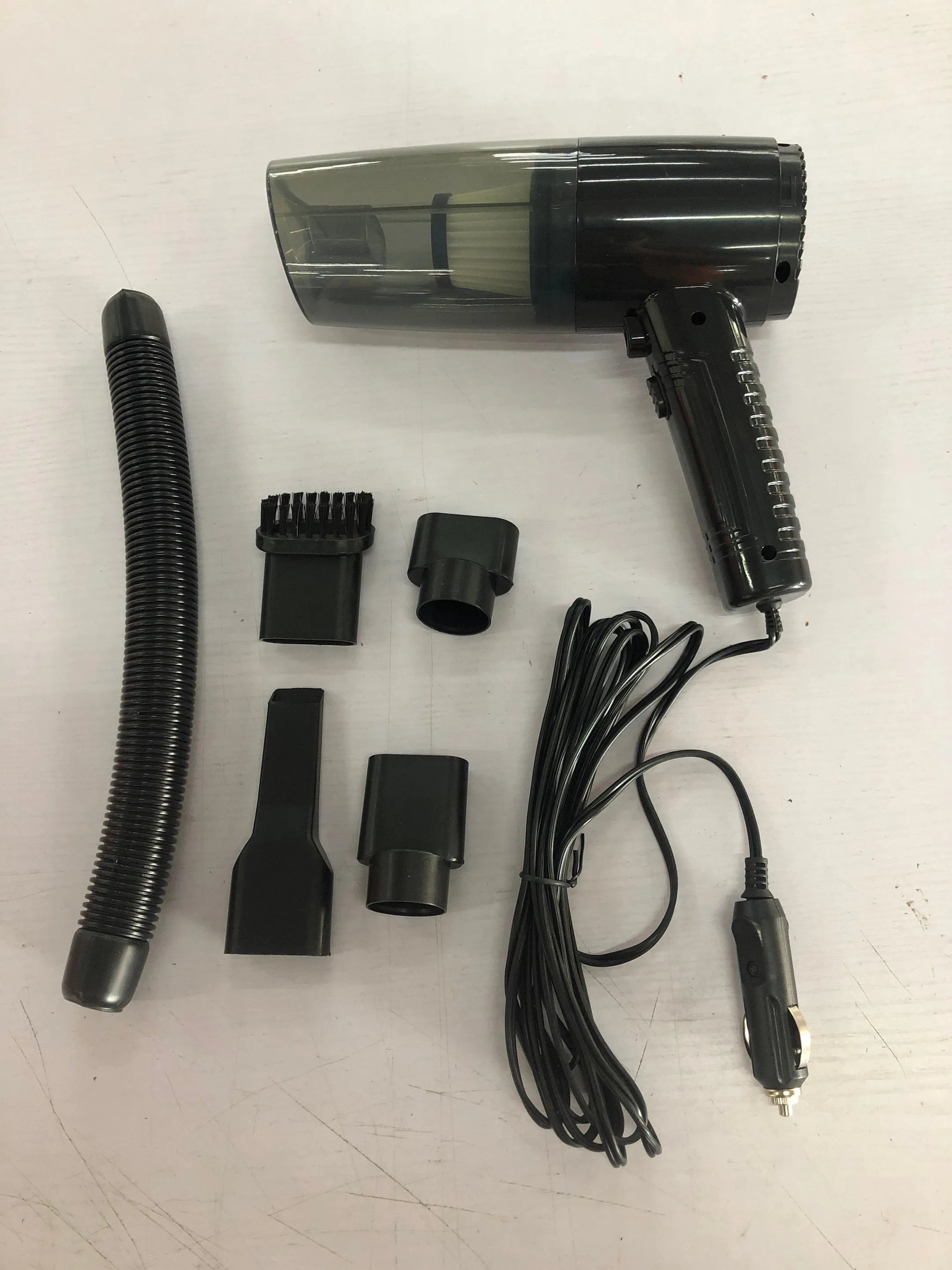 Starry sky black and pearl white car vacuum cleaner with accessories on a 5 metre cable.