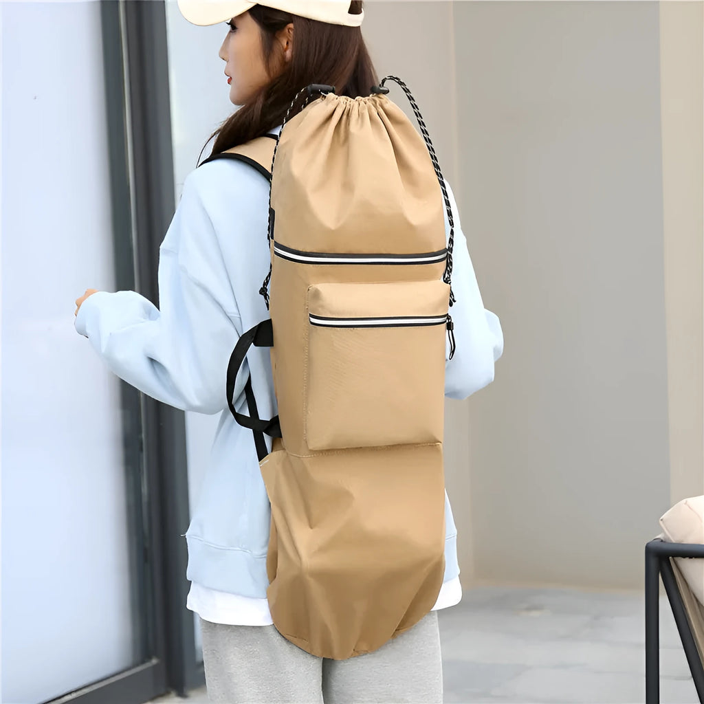 Black waterproof nylon skateboard duffel bag with long main compartment for a 90cm board or fishing rods.