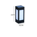 Waterproof solar garden light with LED, stake, and solar panel in a UK garden setting
