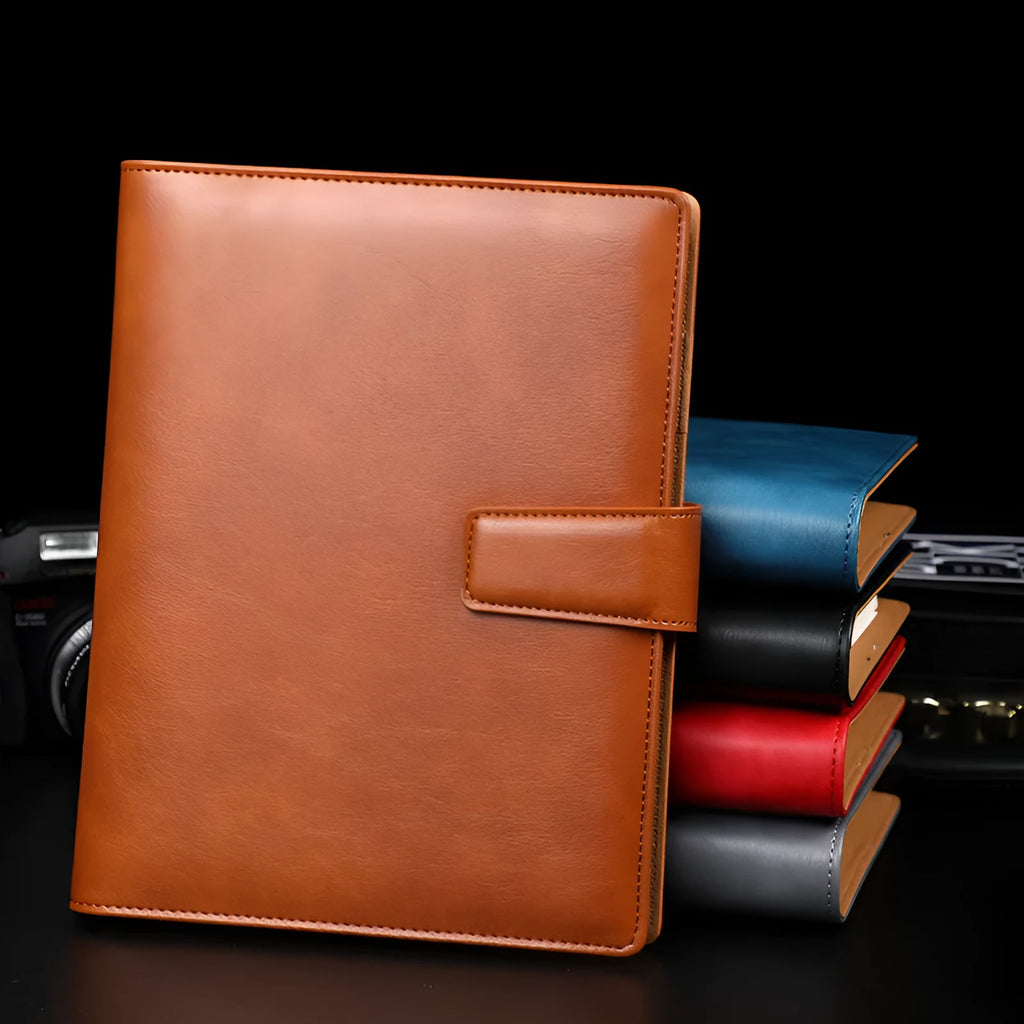 Hardcover A5 leather notebook with buckle closure in five colour options showing interior Daolin paper