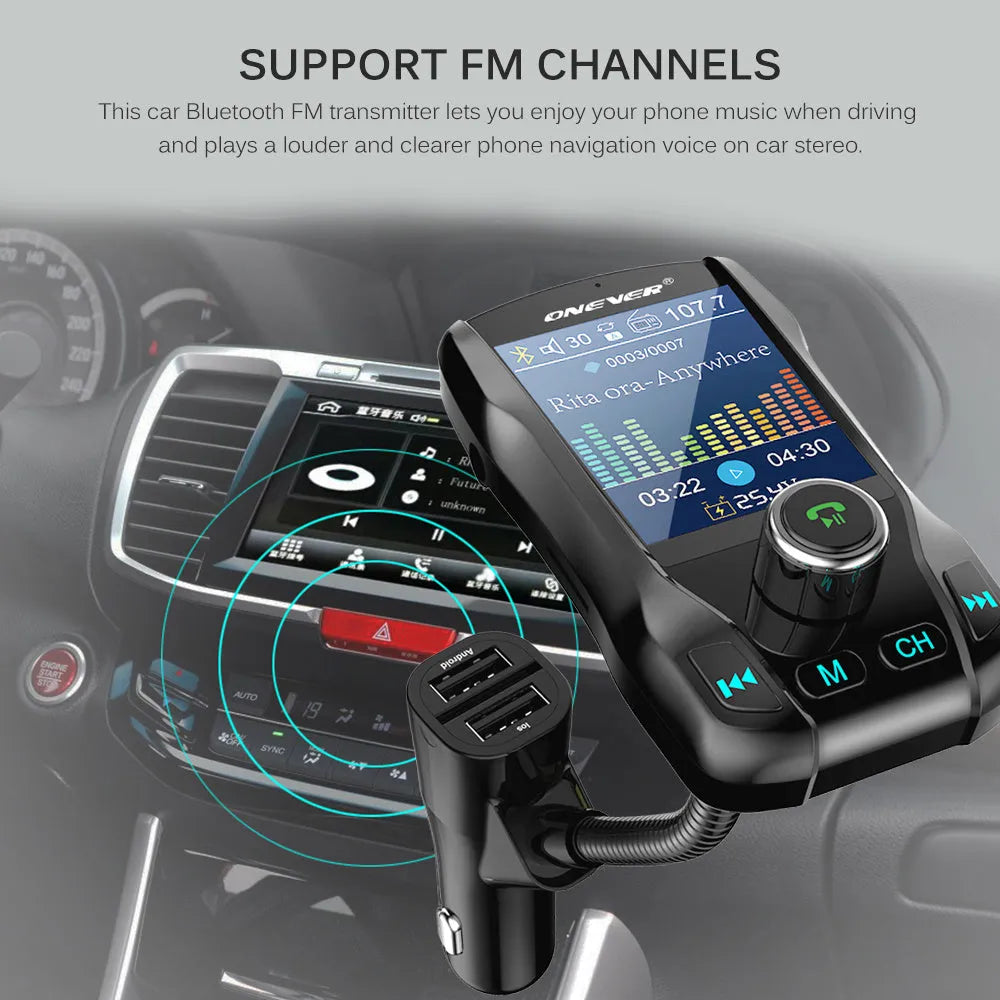 Black in-car Bluetooth FM transmitter with colour screen showing voltage, plugged into a car power socket.