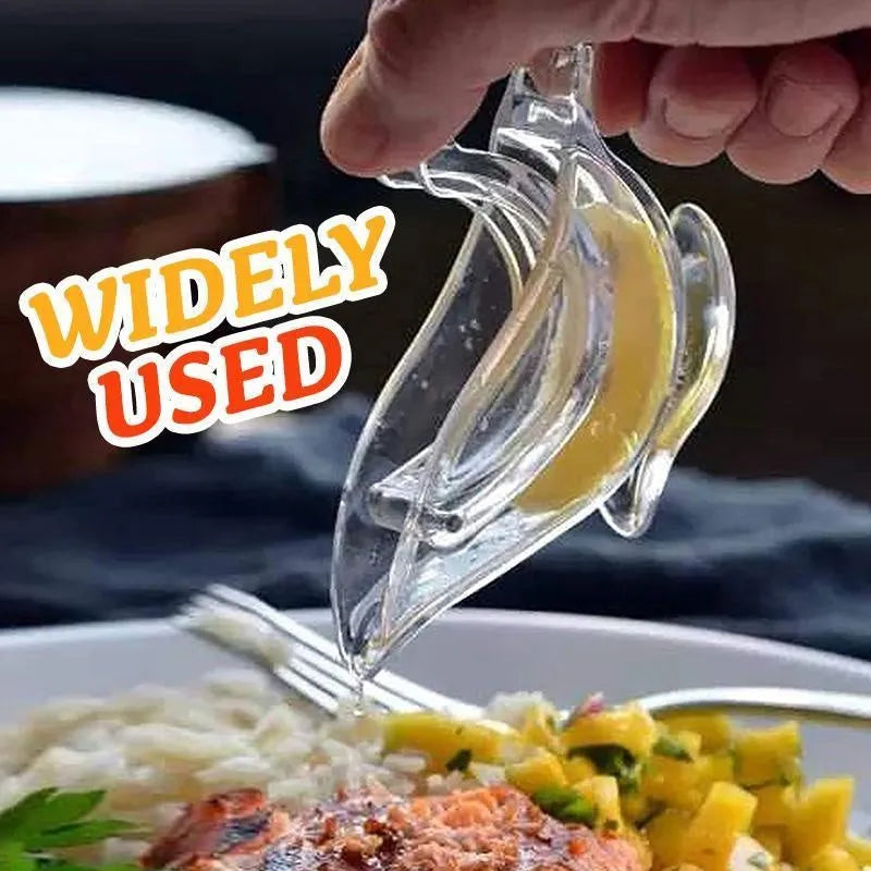 Transparent acrylic bird-shaped manual lemon juicer on a kitchen counter.