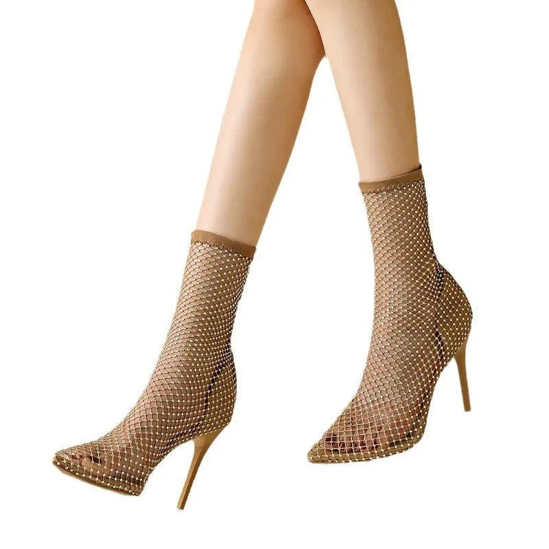Gold mesh pointed-toe stiletto high-heel sandals with a rubber sole.