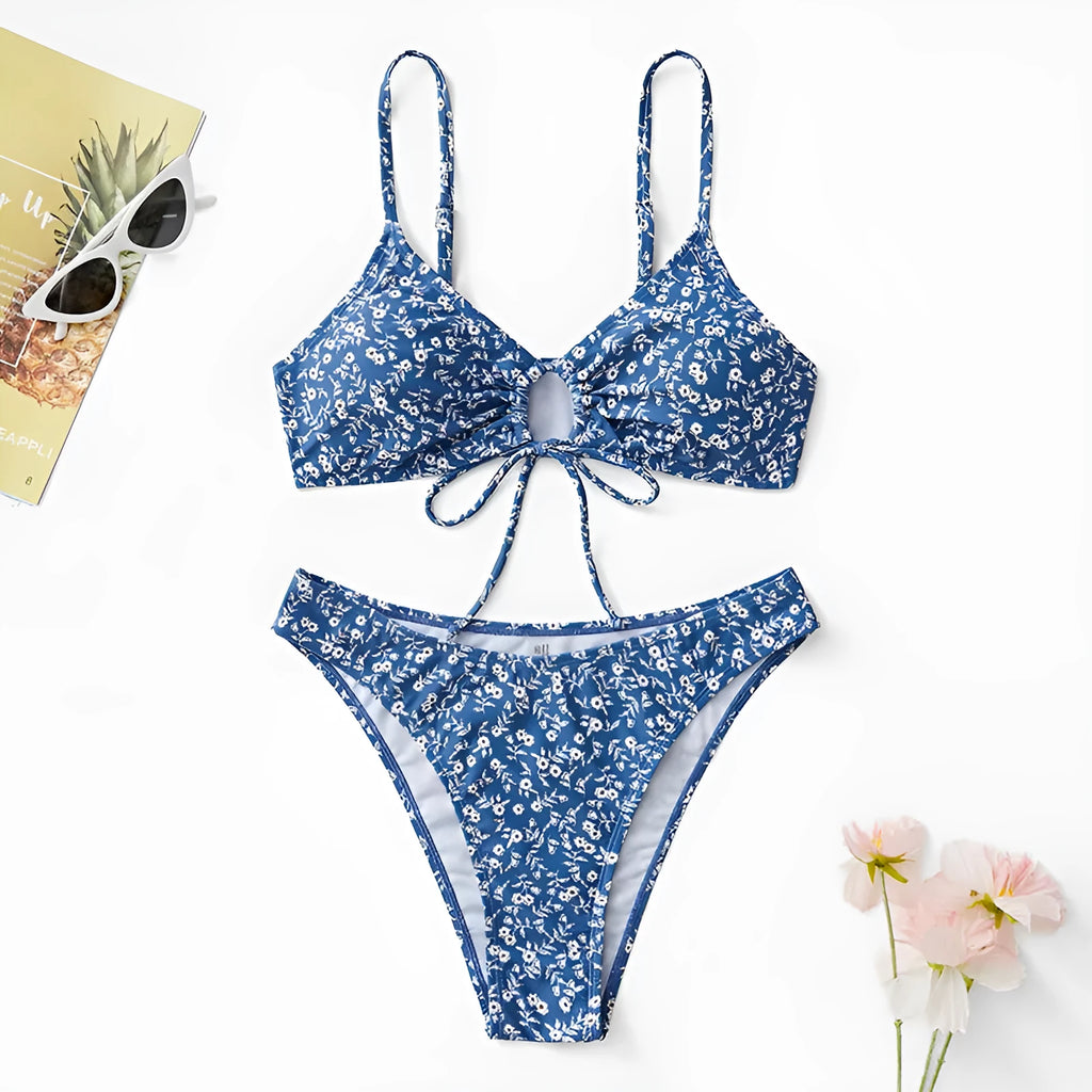 Blue polyester swimsuit three-piece set with top and shorts for swimming.