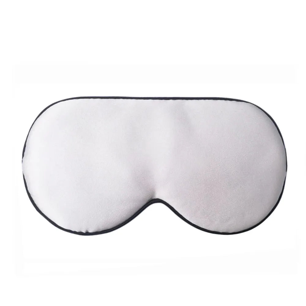 Double-sided mulberry silk sleep mask with embroidered print in various colours.