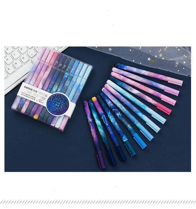 Twelve constellation zodiac ballpoint pens with bright star designs on plastic bodies, assorted colours, set of 12
