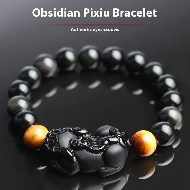 Black Mexico Gold Sheen Obsidian pi xiu bracelet with ethnic styling on wrist