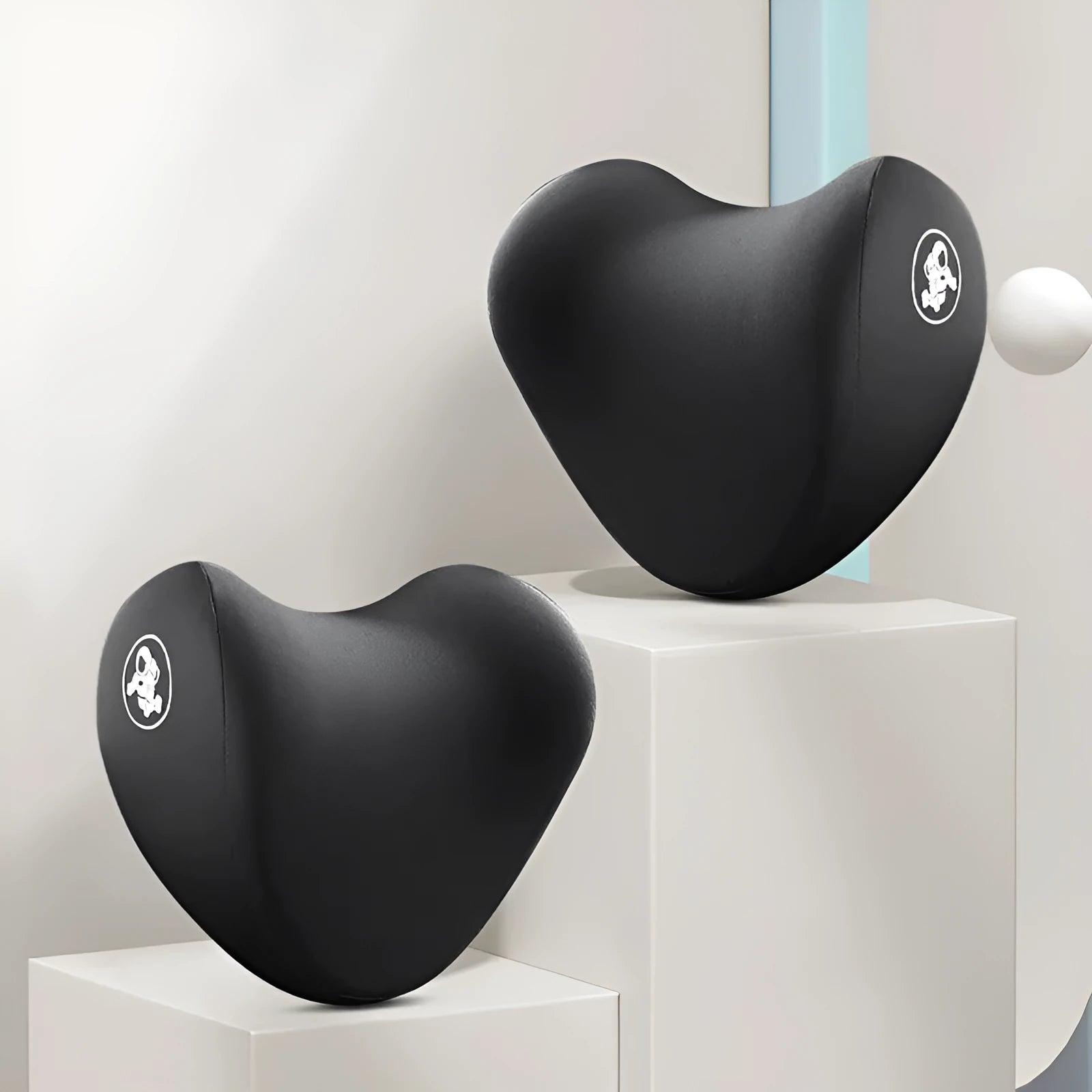 Heart-shaped car pillow set with headrest and lumbar support pillow in soft cotton, shown in assorted colours