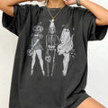 Straight cut loose summer t-shirt in cotton fabric on a hanger.