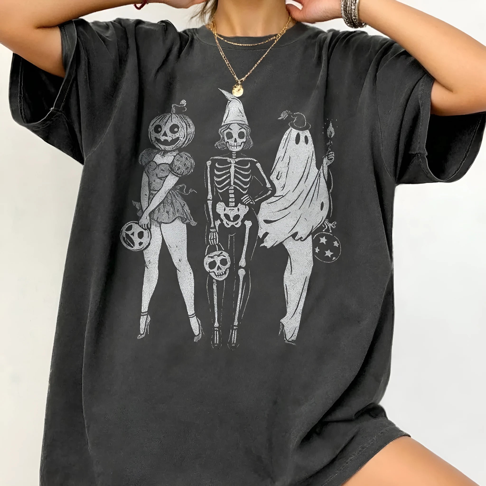 Straight cut loose summer t-shirt in cotton fabric on a hanger.