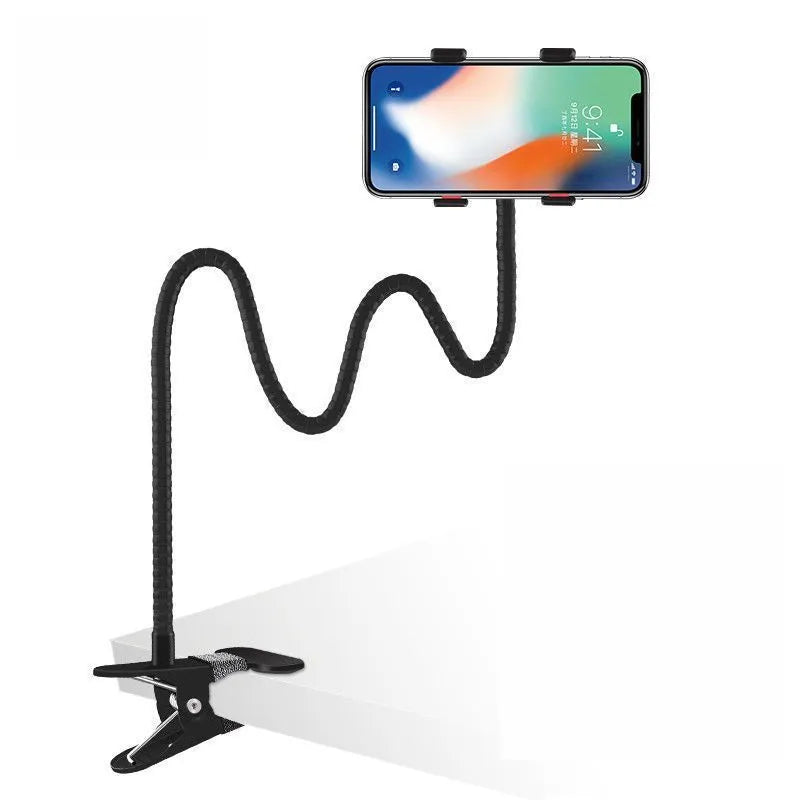 Black metal lazy stand gadget with rotary clip holding a mobile phone on a bedside table
