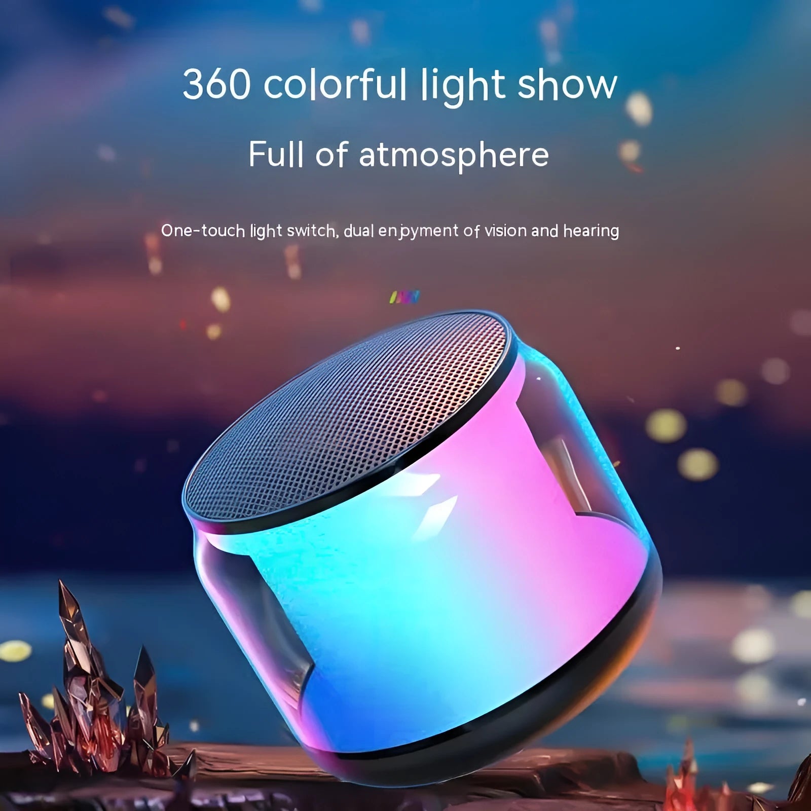 Black gun-shaped Bluetooth speaker with coloured glaze finish on desktop