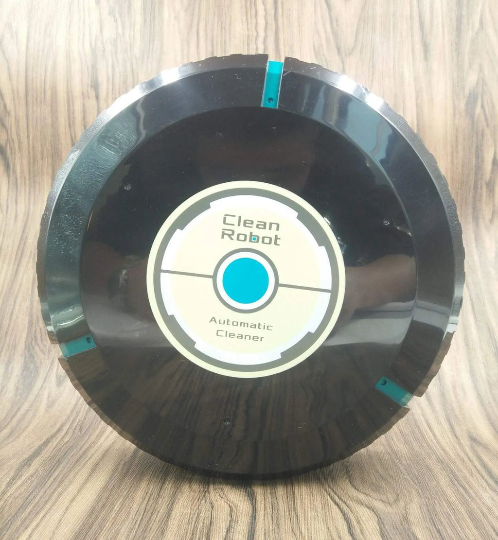 Black or white automatic floor sweeper robot on a hardwood floor.
