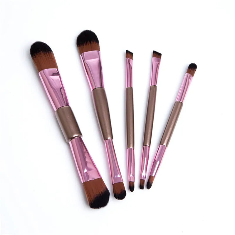 Rose gold double-ended makeup brush set of five with synthetic bristles on white background
