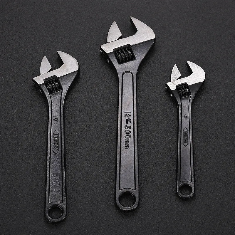 Blackened high carbon steel adjustable open-end wrench spanner showing ergonomic handle