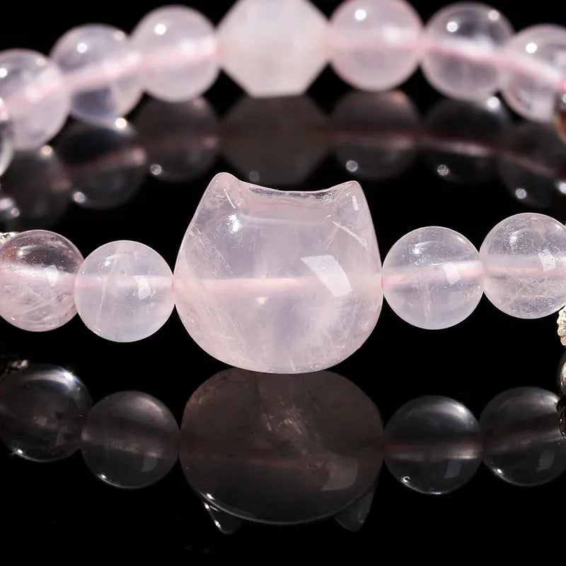 Women's handmade crystal cat head bracelet with natural star light pink crystal and copper geometric setting