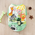 Small dog wearing a colourful printed polyester t-shirt for casual spring or autumn weather.