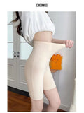 Women's liquid seamless high waisted nylon tight pants in black, with hip lifting and belly control function