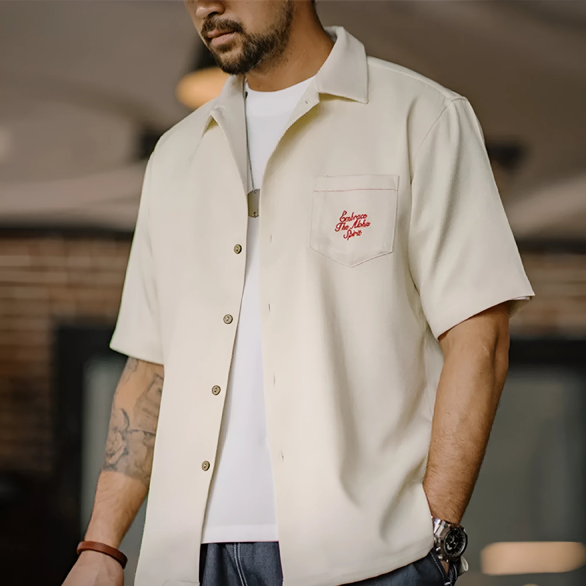 Men's light apricot shirt with bamboo floral print and a Cuban collar