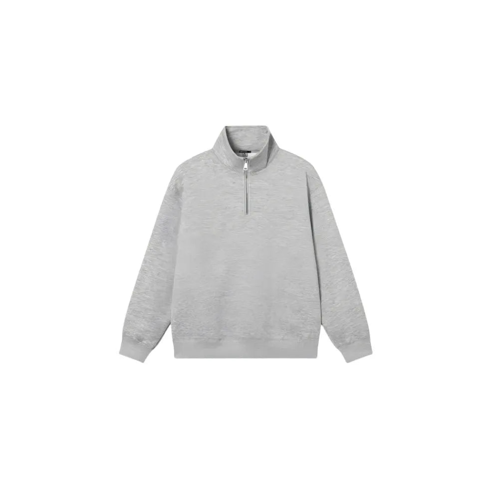 Grey half-zip cotton hoodie with a stand collar, shown on a model.