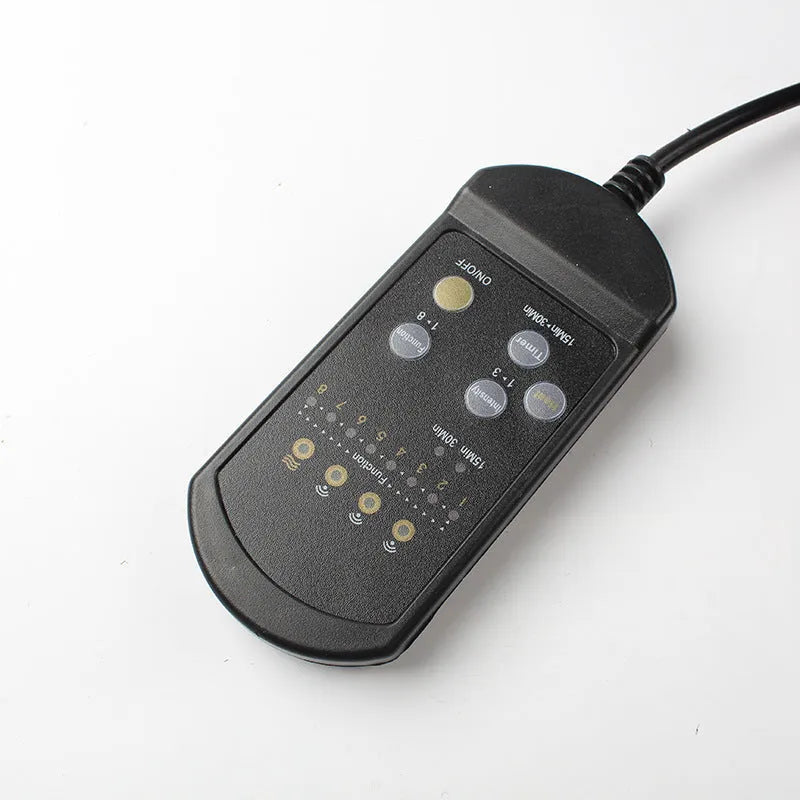Black heating massage mat with infrared physiotherapy function and adjustable speed control on seat cushion