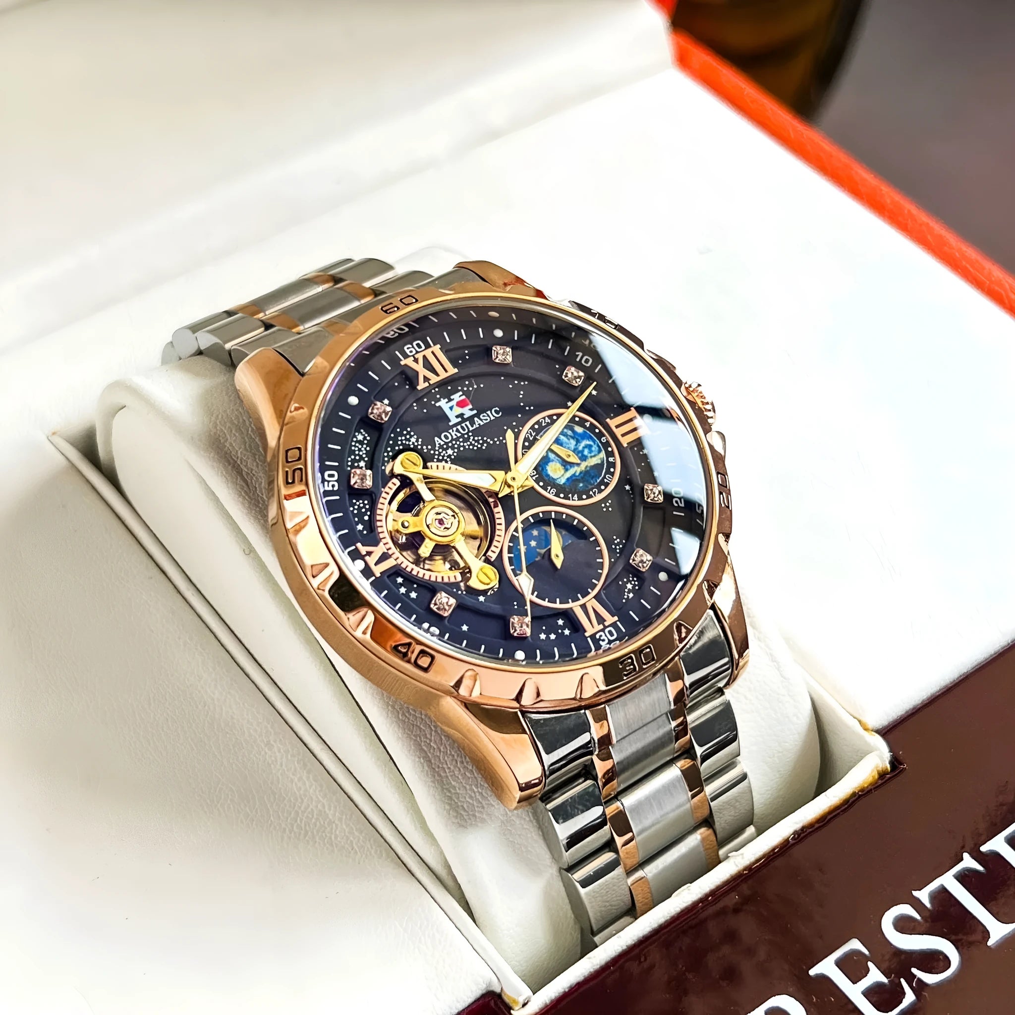 Men's rose gold automatic mechanical watch with black dial and stainless steel strap