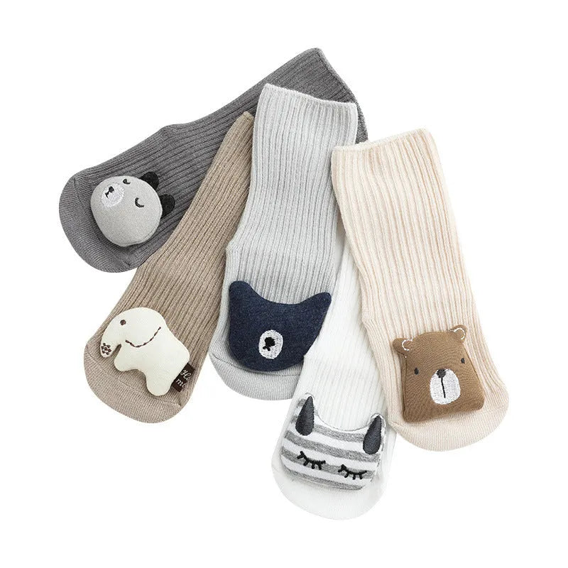 Non-slip baby socks with dispensing glue feature in cotton material, showing mid-calf height and colour options
