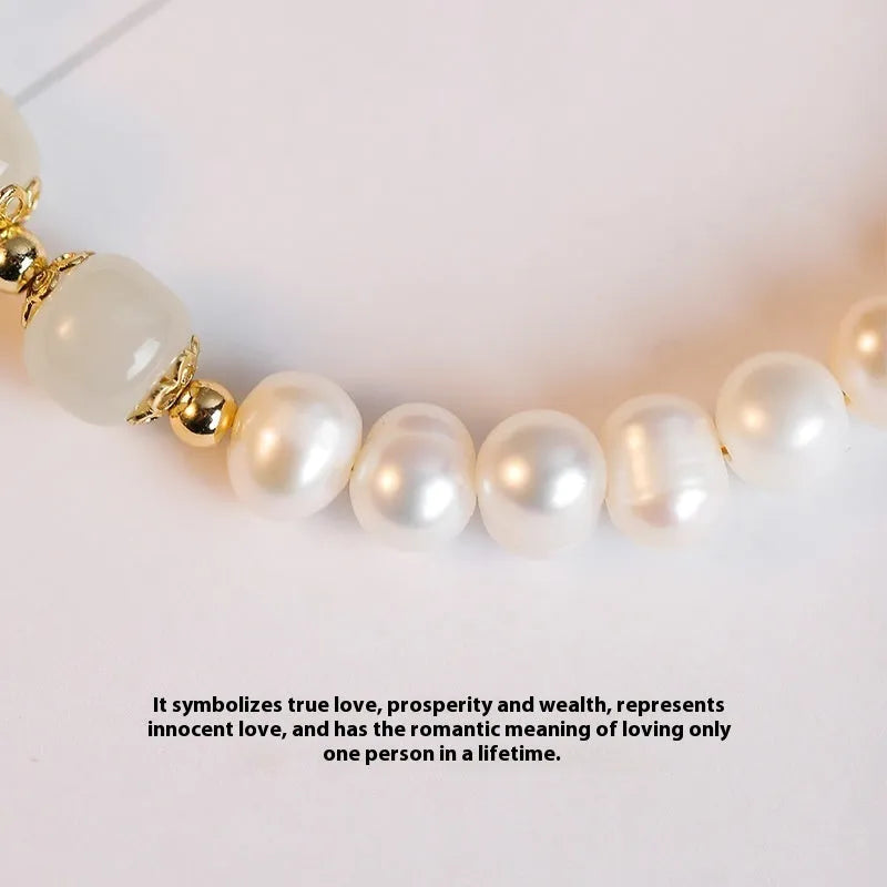 Natural freshwater pearl bracelet with a diamond-shaped electroplated pendant in Hetian jade colour.