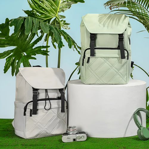 15.6 inch nylon school backpack in light green colour showing laptop compartment and three-dimensional pockets