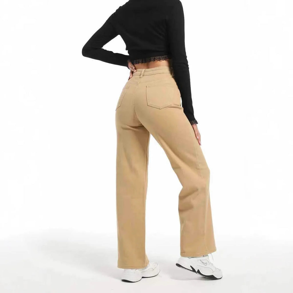 Women's high-waist straight leg jeans in apricot colour with a wide leg cut.